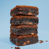 Image of four stacked Killer Brownie Chocolatier Chocolate brownies