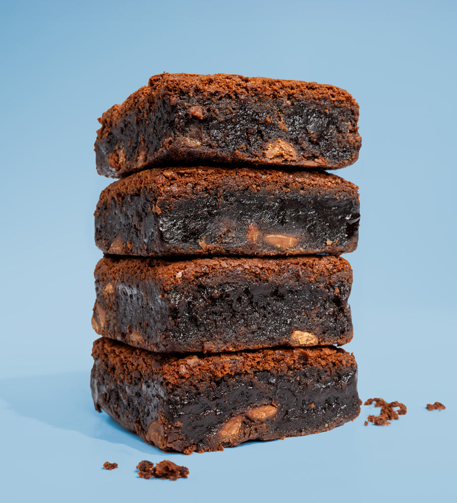 Image of four stacked Killer Brownie Chocolatier Chocolate brownies
