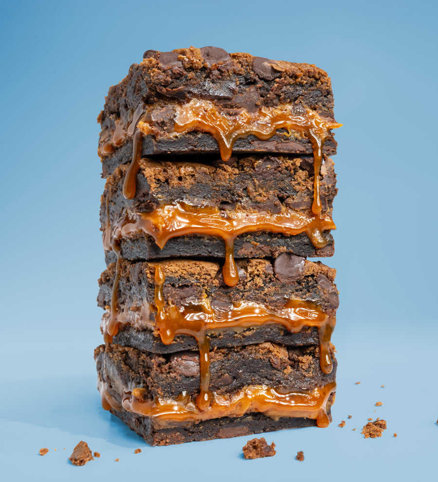 Image of stacked Killer Brownie Triple Chocolate with caramel brownies