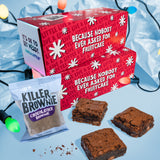 Red gift box with text and brownies on a blue background