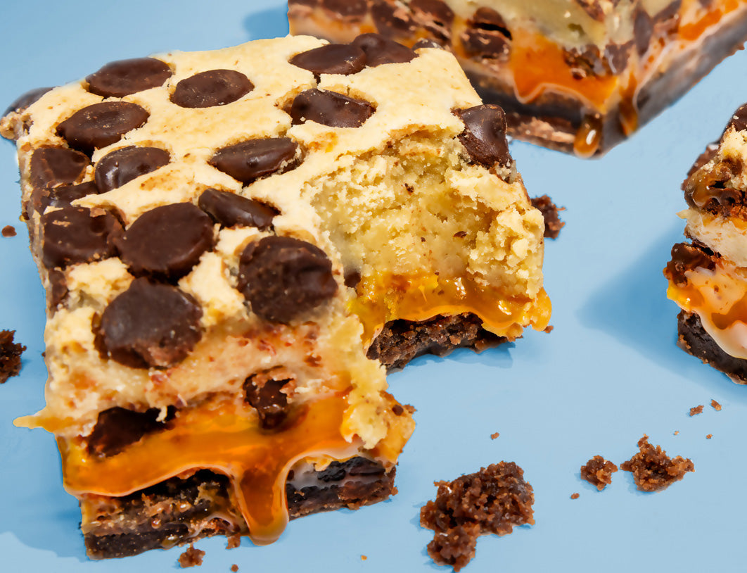 Killer Brownie Cookie Dough with Caramel Layered Brownie with bite