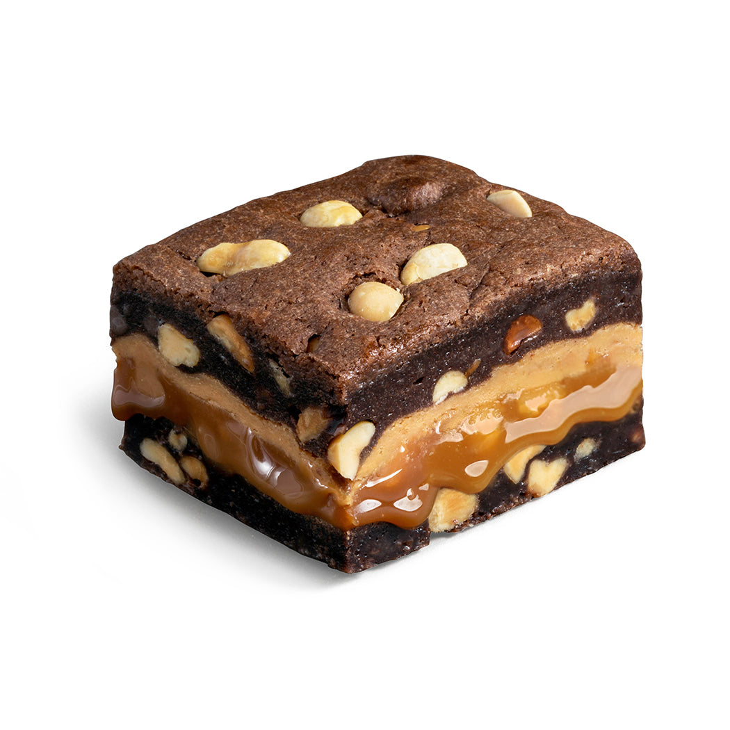 Killer Brownie Chocolate Brownie with Peanuts and Peanut Butter with Caramel Layer bite square